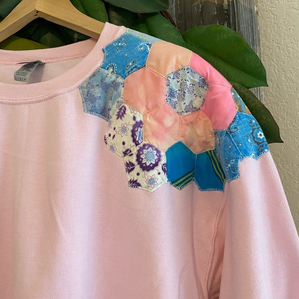 Homemade quilted sweatshirt from a vintage quilt.